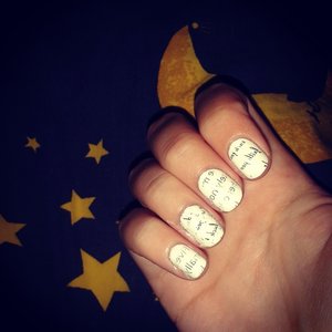 trying out newspaper patterned nail for the first time :P
