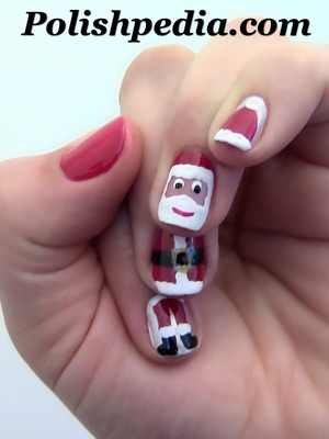 Celebrate with Santa on your nails!

Watch My Video Tutorial @ http://polishpedia.com/santa-claus-nail-art.html