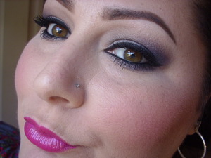 I love smoked out navy shadow w/ a bold black winged liner and a hot pink lip! This is one of my favorite looks to wear when I REALLY want to get noticed :)