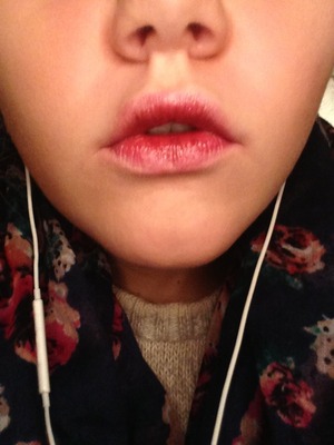I first put primer on my lips and then I blended my usual cover up into the center of my lips. Next I added a light pink lipstick to the middle of my top and bottom lips. Then I added a deep red lipstick to the center of my top and bottom lip. To slightly blend pop your lips. Next add a light pink eye shadow to the outside of your lips to define the lightness. Last put a little pink tinted gloss in the center of your lips!