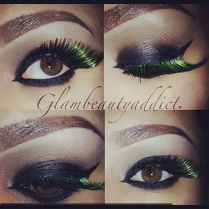 Smoky winged eyes with black/green falsies..