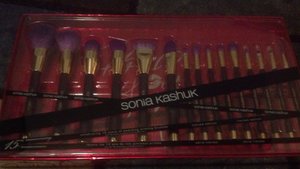 I'm a big fan of Sonia Kashuk brushes so I was happy to grab these at Target! For $39, it's a good buy considering her deluxe brushes run from $14+ each.
You get 14 brushes and spoolie, which could've been left out in my opinion. The bristles are so soft and purple! These hopefully won't get stained like my Sugarpill brushes with pink bristles. 
This set contains: Powder brush, Blusher Brush, Duo-fiber buffing brush, Synthetic angled multipurpose brush, Contour brush, Foundation brush, Concealer brush, Blending brush, Crease brush, Small eye shadow brush, Fluffy eye shadow brush, Precision smudge brush, Synthetic angled liner brush, Smudge brush, and the stupid spoolie on a stick.
I'm pretty excited to be working with these brushes! :D 

....but not the stupid spoolie on a stick.  