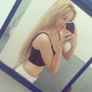 blonde long hair , extensions , 
i need help im a natural blonde but this blonde is making me look so white ! even other people are saying it help me :(