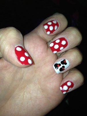I polished my nails using OPI Color so Hot it Berns and I Do! I Do! And then used a shush kabob stick to make polka dots and the Minnie Mouse. Topped off the Minnie Mouse with a red rhinestone to look like a bow