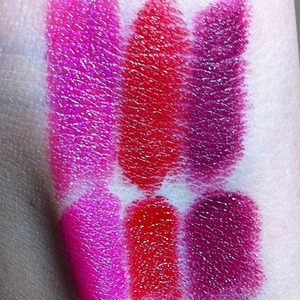 The colors on the top are from the Milani Color Statement line. The MAC lipsticks are on the bottom. Milani's "Raspberry Rush" is a dupe for MAC's "Show Orchid," "Best Red" is a dupe for "MAC Red," and "Sangria" is a dupe for "Rebel."