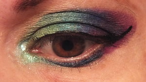 Sugarpill Inner lid and crease inner to outer: Lumi over Absinthe, Absinthe, Tipsy, Darling, Royal Sugar. Outer V is 2 a.m. around Poison Plum around Elemental Chaos. Lower lash line inner to outer is Lumi over Absinthe into Tipsy, Royal Sugar, Poison Plum. I learned that Sugarpill shadows are a bit more saturated than other LOOSE shadows, are on the dark side (having white to blend with is a good idea), and go very well with one another.