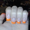 Orange tipped nails