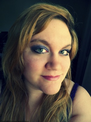 Testing out colors to bring out my eyes. Purple to bring out the green... What do you think?