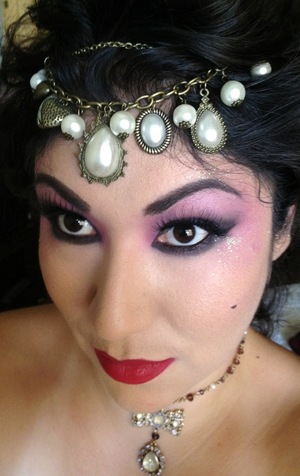 Moulin Rouge makeup with Marie Antoinette in mind.
Wet n Wild palette in Petal Pusher
Mac Russian red lipstick 