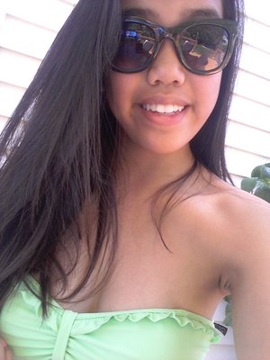 I want to change up my look for the summer ! my hair is dark brown and the length is right above my cheat area 

sorry about the awkward selfie I was tanning :p

