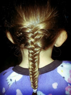 Picture of a french fishtail i did on my little sister's hair :)