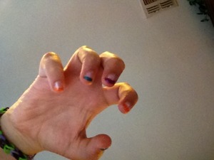 My own little creative style. I just painted my nails white and I painted the top of my nails a certain color!