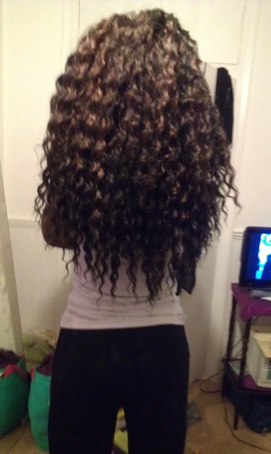 my hair curly. black and brown 