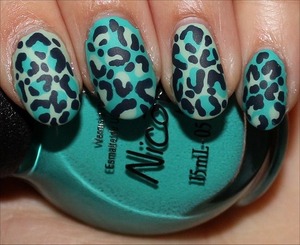 I used 3 Nicole by OPI shades: I Shop Mintage, Teal Me Something New & This Blue Is So You! I also used the Nicole by OPI Matte Top Coat. Click here to see more swatches: http://www.swatchandlearn.com/blog-news-my-leopard-nail-art-tutorial-on-promcanada-com/