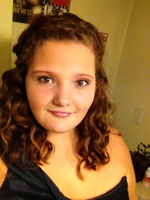 This is from my 8th grade dance my hair is curled and I did a simple eye to look nice but not over done(: