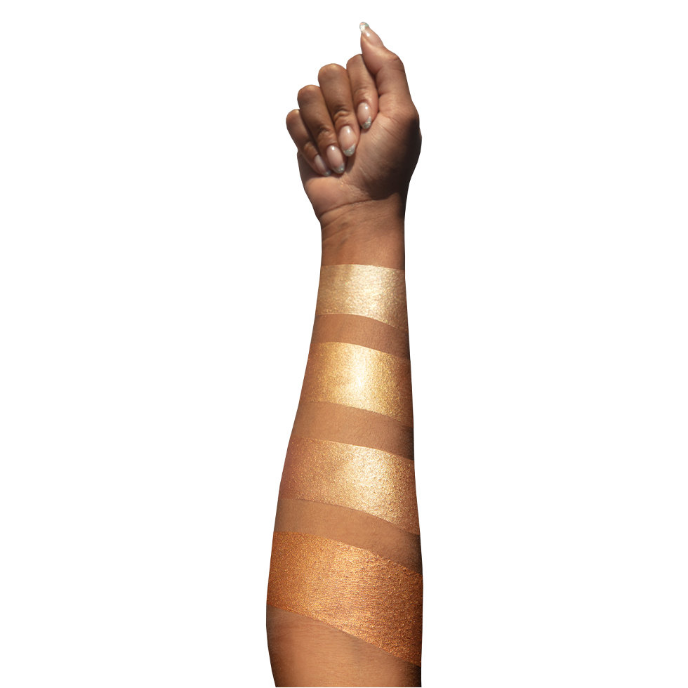 Dominique Cosmetics Skin Gloss Arm Swatch – Deep