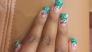 Get in to the school  mood with a Teal French  tip and a few swirls 