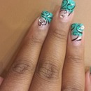 Teal nails with swirls