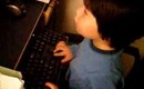 toddler plays games on the computer