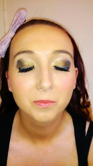 yellow,  black and gold eyeshadow with pinky lips! 