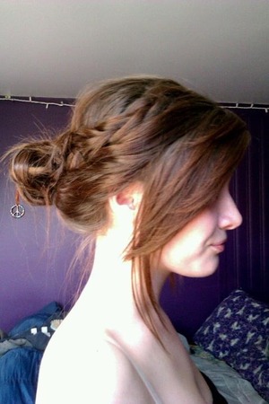 Bad hair day? Nothing a few braids leading into a messy bun wont fix! 