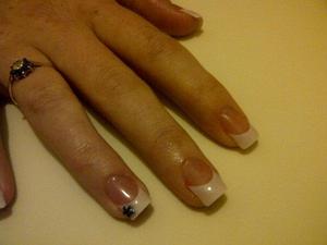Gel nails, white tips, with purple star added to one nail only.
Created using 'The Edge' clear gel, and resin (all buffers/files are products from 'The Edge' also) 