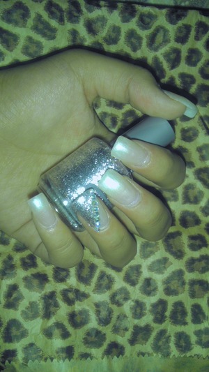 white pearl nail polish with a silver touch