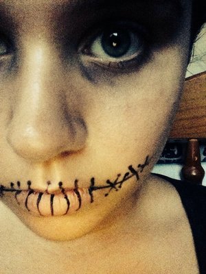 This is a simple Halloween makeup look! Easy but effective! Put it this way, if you answered the door like this, kids are gonna crap themselves!