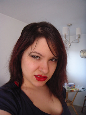 Testing out red lips, slightly dark eyes