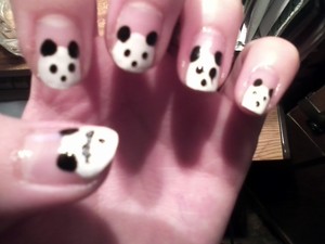 My attempt at the Panda Bear Nails.  Didn't turn out so great because my black was super sticky.