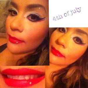 Navy blue winged double cat eye using red ;) on lower lash line. Supper matte red lip and stars 🌟🌟🌟