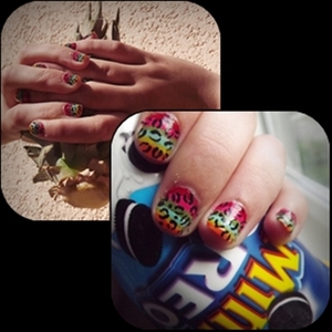 My good friend made it.It was taking at least for an hour. What do you need? Of course, patience, nail polishes and a small brush. Just draw small lines and at the end, draw small stripes like cheetah design. :))