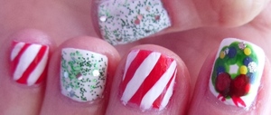 http://beautybesties.wordpress.com/2011/11/27/diy-christmas-wreath-nail-art/