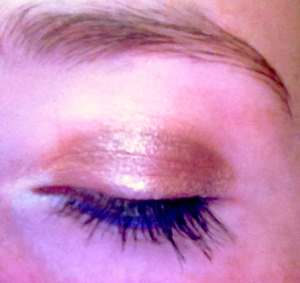 Golden smokey eye, with the pop of purple on the lower lashline. I think it spices things up a bit.