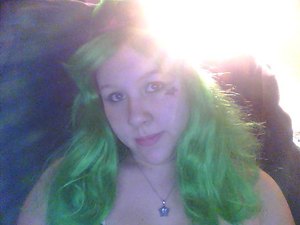 I was just messing around with some makeup ideas with my green wig and star bandanna. I failed miserably on the star...i need to redo this look.