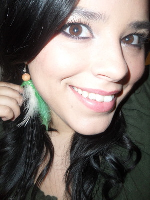 Add some color to your look, with some feather Earrings! 