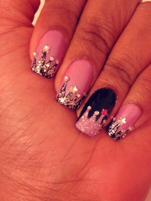 Light purple with black crown designs done with tape and rhinestones