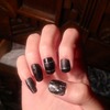 Black matte and shiny nails with textured thumb