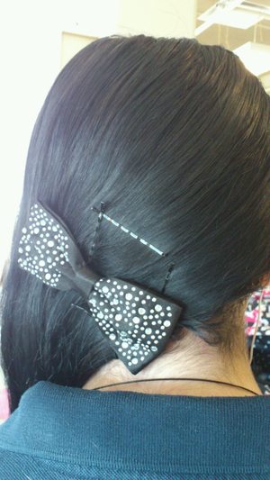 Pull back hair with bow 