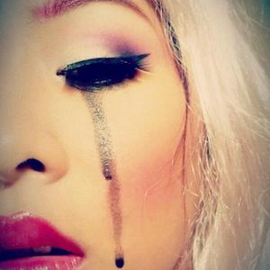 This was my 2011 Halloween look, I was dressing up as a sad ish barbie doll all in pink and red with black tears.