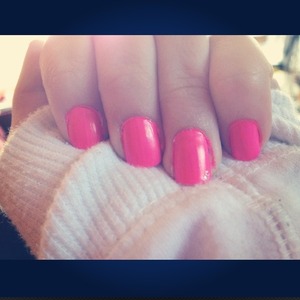 I paint my nails white, then bright pink so the color stands out more.