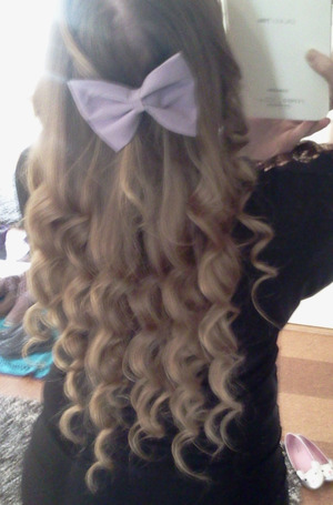 What my long hair looks like curled with a curling iron and a bow. I really do not regret buying this cute bow.