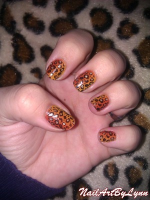 So these are my ombre leopard nails. The brown ombre part is acrylicx maint. I added the konad design over it and in the dots some golden glitter. I really hope you like it. For more designs and info, check my blog: http://nailartbylynn.tumblr.com/