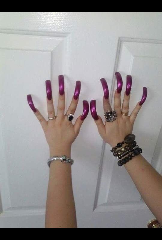 Premium Photo | Dark purple nail design. manicured female hand