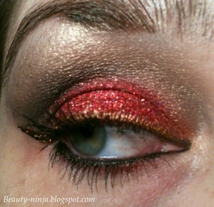 The red is Darling Girl Cosmetics Burning Times glitter over DG Inferno Room shadow. The rest of the shadows are from the ELF 144 neutral palette. Milani Infinite liquid liner in Forever. 