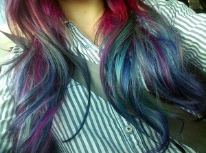 Pink, purple, and blue hair done using bleach and dye