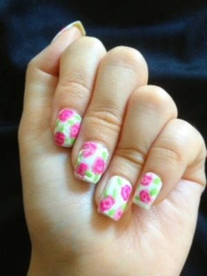 Hi! I tried this kind of floral nail art for once. It was easier than I thought it would be. It isnt that neat though. But I think it is great for summer :D 