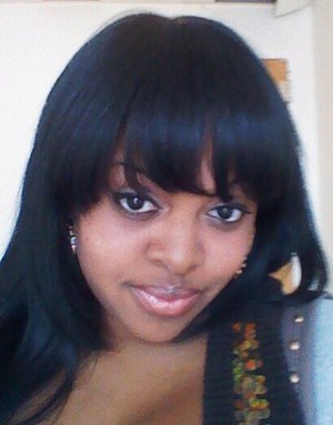 Sew-in with Virgin Remi Hair......natural look just a little eye shadow and my faorite lip gloss (maybelline)