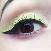 Winged eyeliner yellow liner