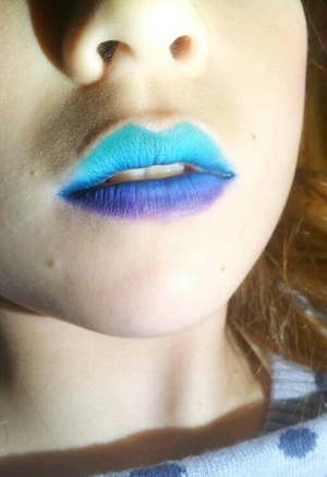 Close up of my littlesisters lips when she was going to a crazy colors birthday party. I just used nyx jumbo pencil in milk all over her lips and then put eyeshadows on top. didn't want to put a gloss on top because i wanted it to last longer, but you could have done that too. 